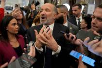 Secretary of Commerce Howard Lutnick speaks with reporters after President Donald Trump address ...