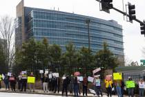 Demonstrators protest Centers for Disease Control and Prevention (CDC) layoffs in front of the ...