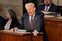 President Donald Trump addresses a joint session of Congress at the Capitol in Washington, Tues ...