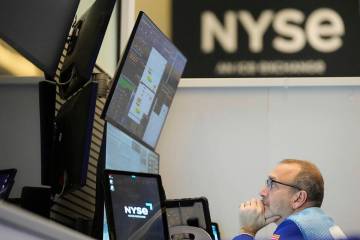 People work on the options floor at the New York Stock Exchange in New York, Tuesday, March 4, ...