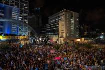 People take part in a protest in Tel Aviv, Israel, Saturday, March 8, 2025, demanding the immed ...