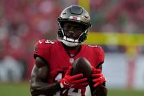 Tampa Bay Buccaneers' Chris Godwin warms up before an NFL football game against the Philadelphi ...