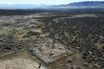 An employee stands near the Thacker Pass mine site on April 24, 2023, near Orovada, Nev. (AP Ph ...