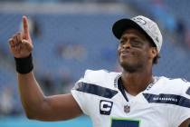 Seattle Seahawks quarterback Geno Smith celebrates after the Seahawks defeated the Tennessee Ti ...