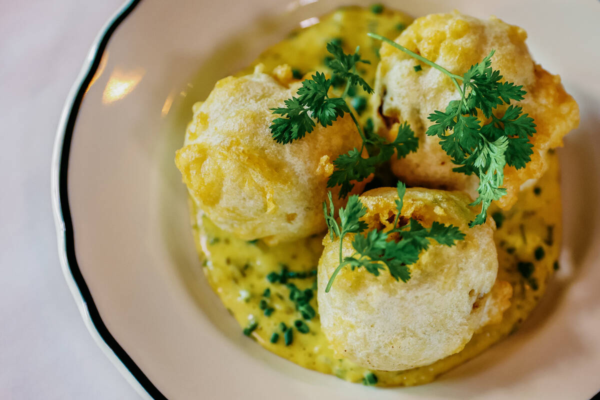 Brandade Croquettes are plated at Bar Boheme, a new restaurant by chef James Trees, in the Arts ...